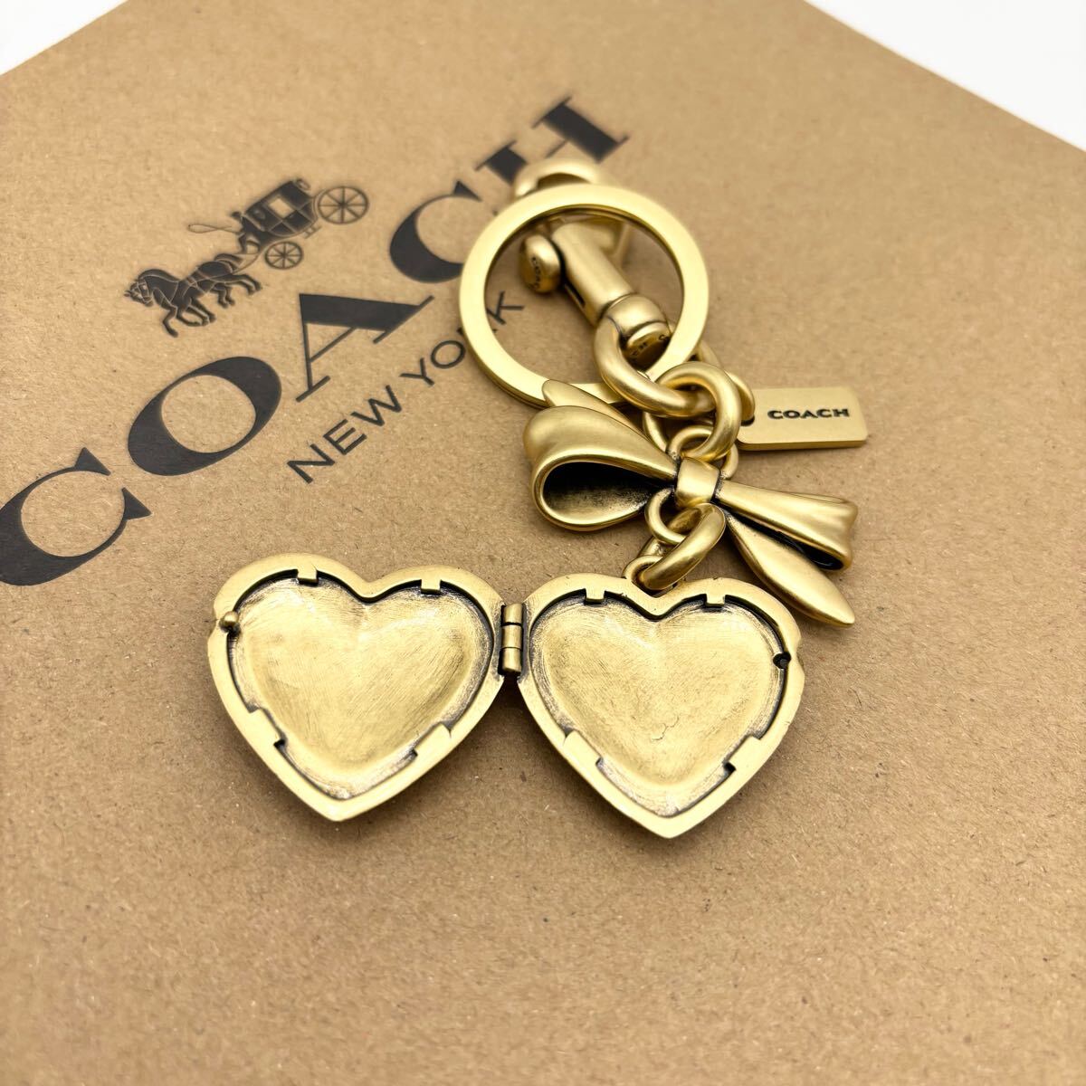 [COACH* новый товар ] bow Heart Rocket сумка очарование! латунь рубин!