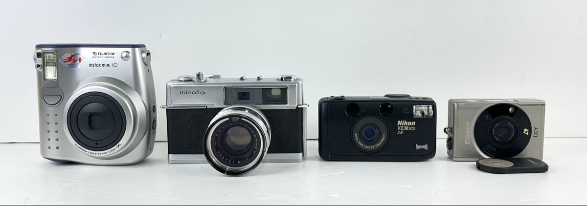 【STK5314】カメラ おまとめ 12個セット Canon Nikon minolta など カメラ フィルムカメラ レンズ 双眼鏡 スタンド ストロボ カメラ機器_画像2
