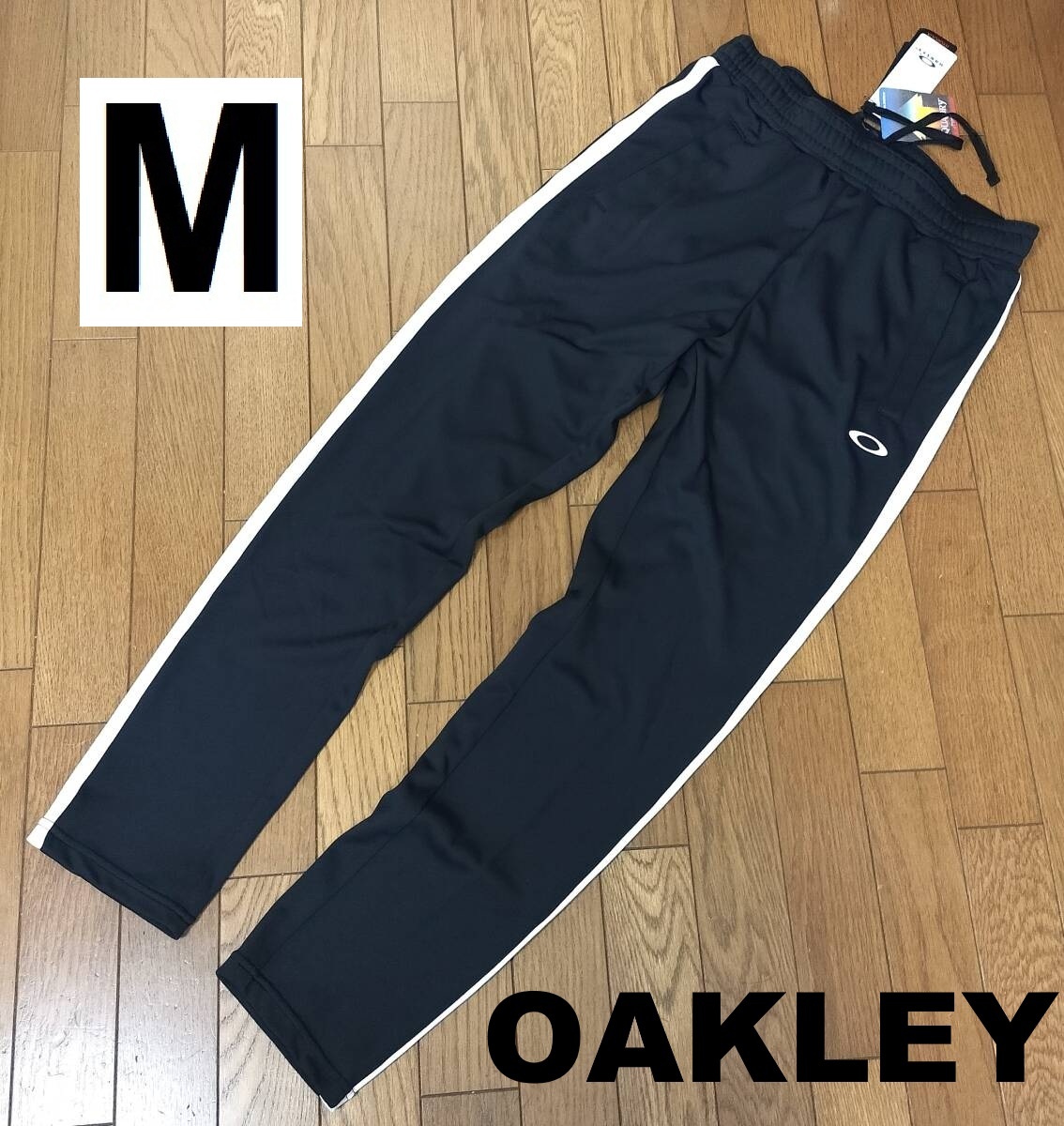 定価7,700円　新品　オークリー　ジャージパンツ　FOA403574　 黒白　ブラック　メンズM_画像1