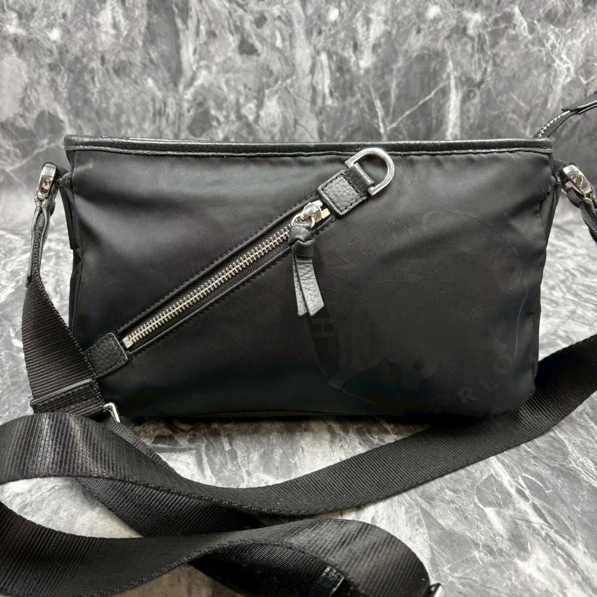 HUNTING WORLD ハンティングワールド ショルダーバッグ サコッシュ 斜め掛け クロスボディ メンズ ロゴ レザー ナイロン ジップ ブラック _画像2