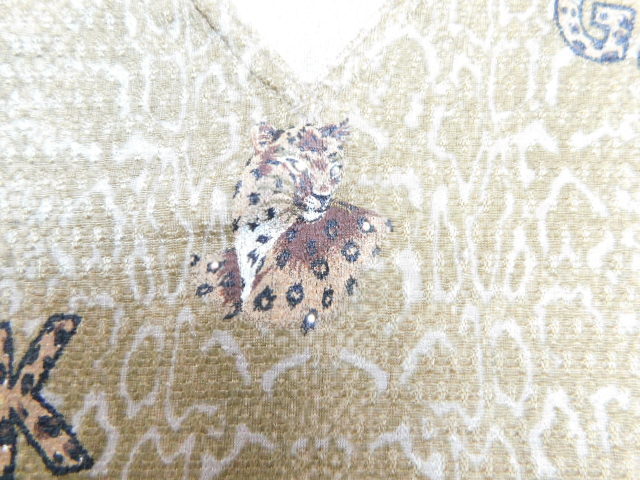 11 Italiya beautiful goods leopard paint .GK*GOJI Logo no sleeve size 7 number prompt decision :9 number. person lady's 