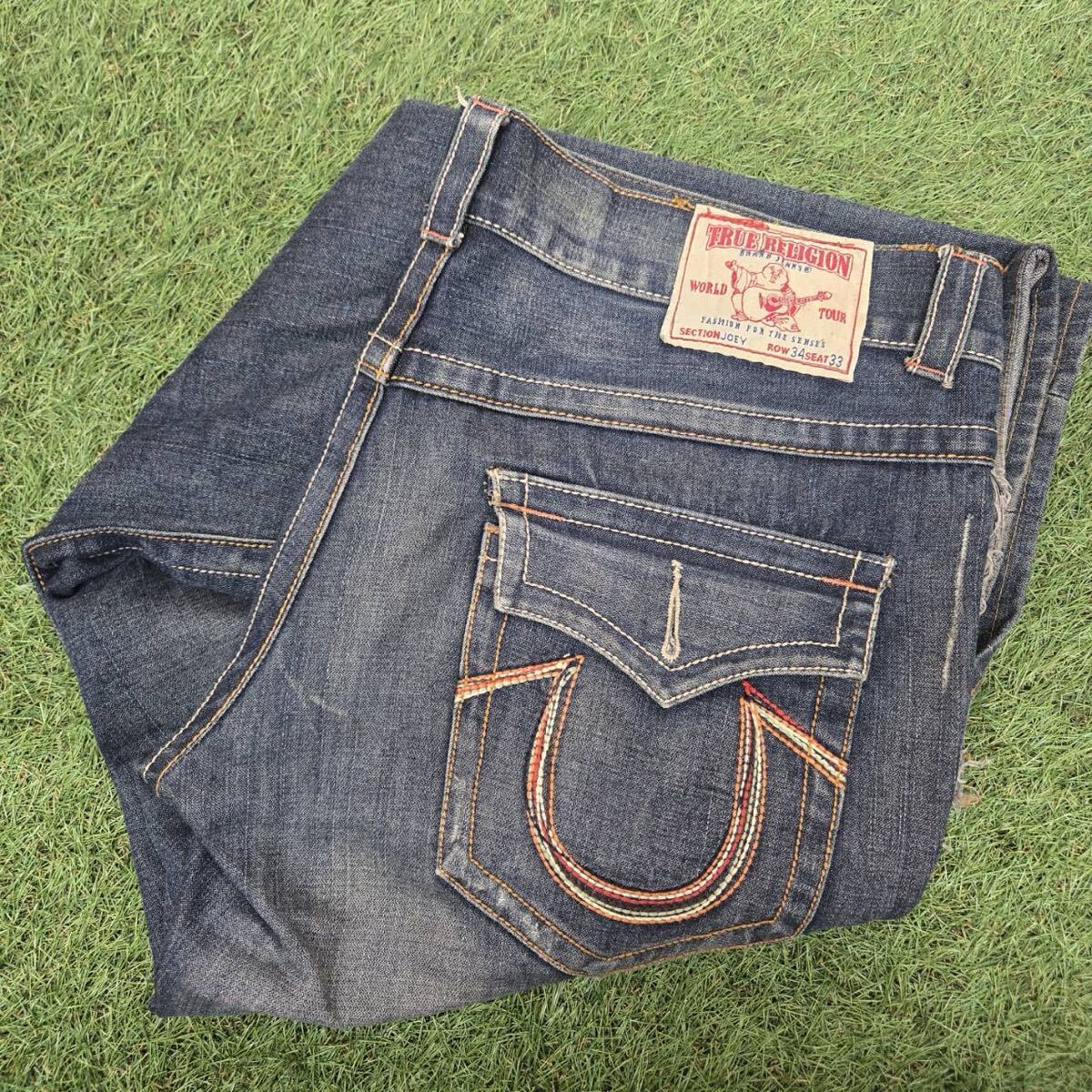 TRUE RELIGION JOEY 34X33 ブーツカット デニムジーンズ USA製 裾ダメージ 色落ち 中古【希少】 現状品／1円スタート_画像1
