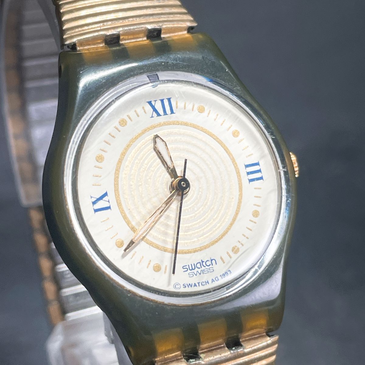 Swatch スウォッチ LITTLE ROCK LM109 腕時計 アナログ クオーツ 3針 伸縮バンド ゴールド ラウンド 新品電池交換済み 動作確認済み_画像2