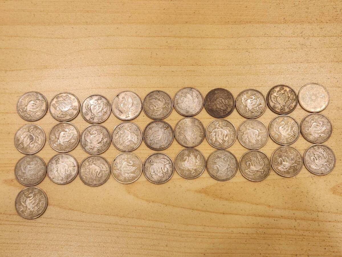 100 иен серебряная монета 56 листов ( феникс 31 листов * Tokyo . колесо 16 листов *..9 листов )