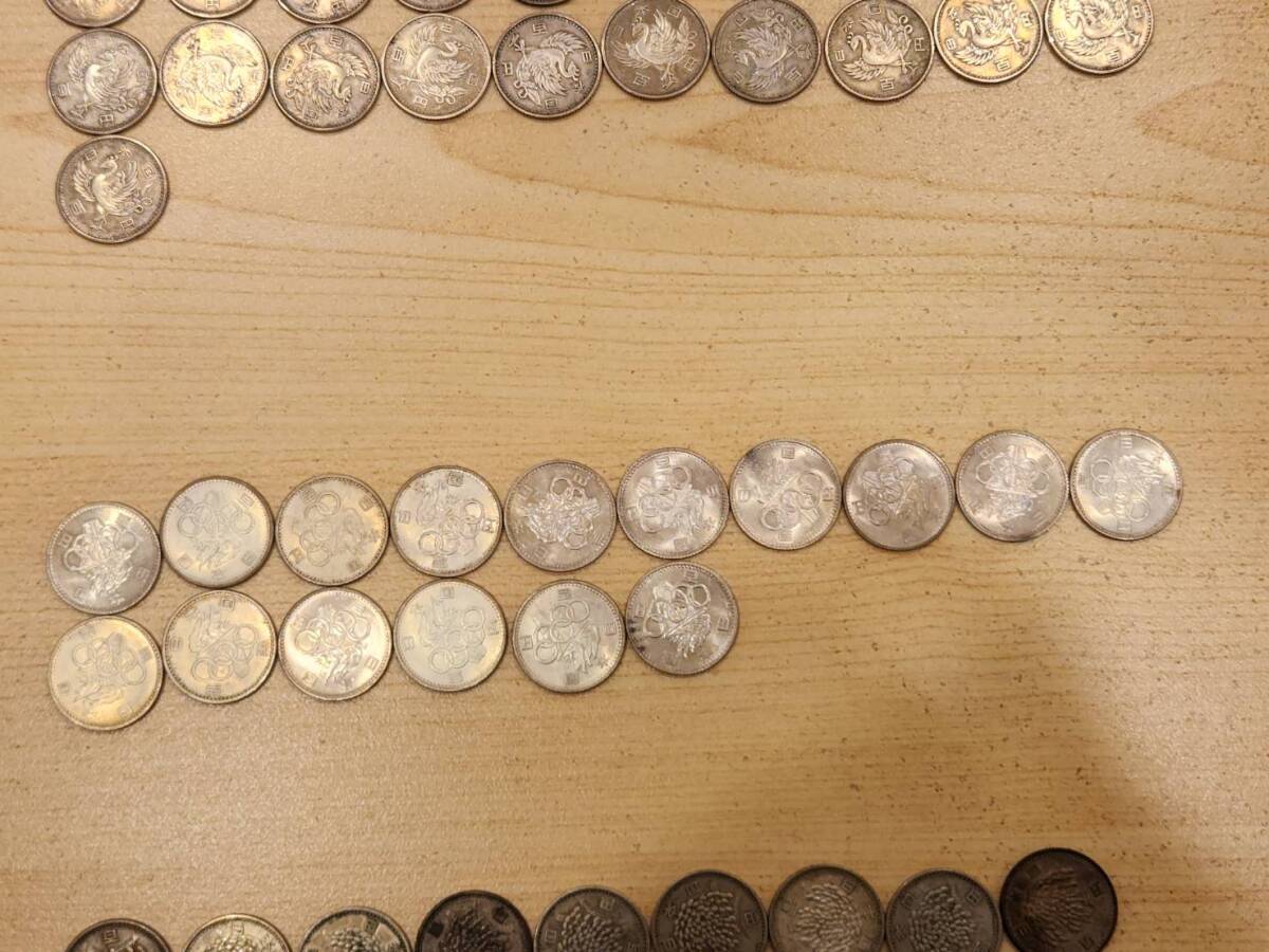 100 иен серебряная монета 56 листов ( феникс 31 листов * Tokyo . колесо 16 листов *..9 листов )