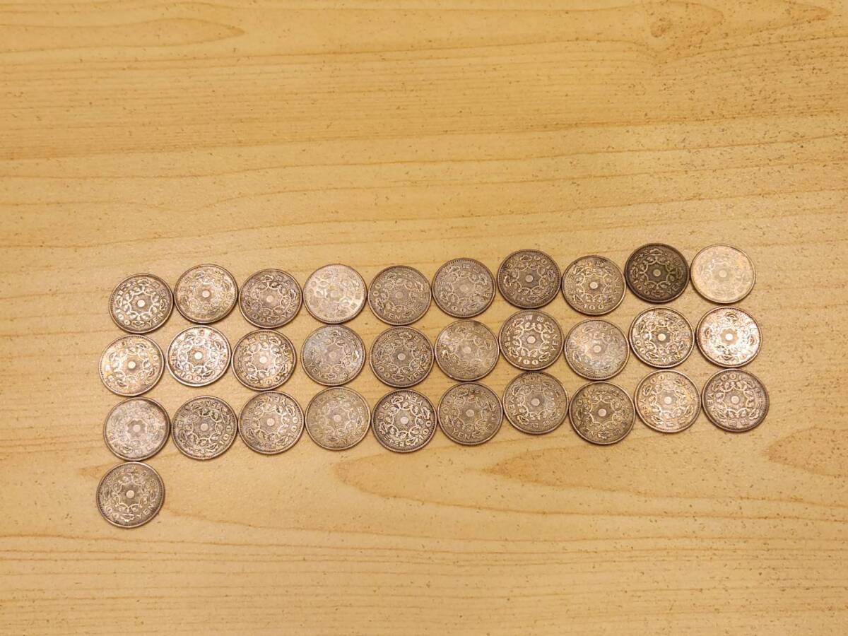 100 иен серебряная монета 56 листов ( феникс 31 листов * Tokyo . колесо 16 листов *..9 листов )