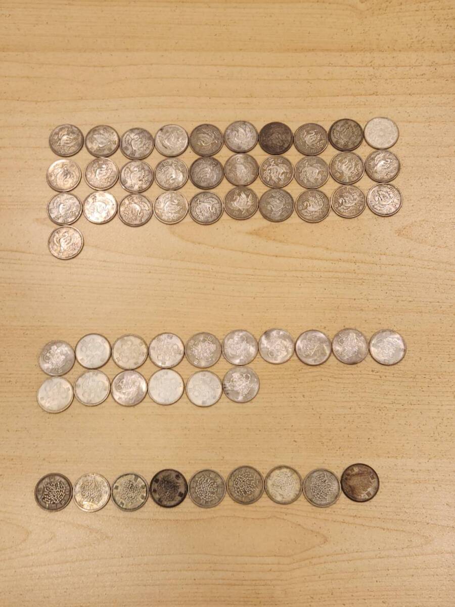 100 иен серебряная монета 56 листов ( феникс 31 листов * Tokyo . колесо 16 листов *..9 листов )