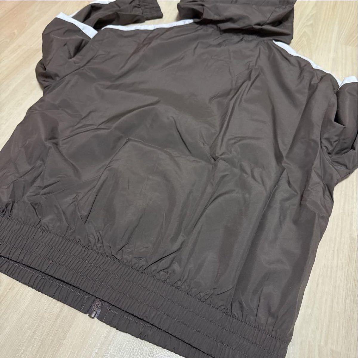 新品NIKEレディースナイロンジャケット ウインドブレーカーブルゾンM