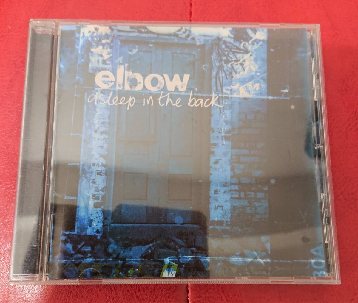 elbow / ASLEEP IN THE BACK