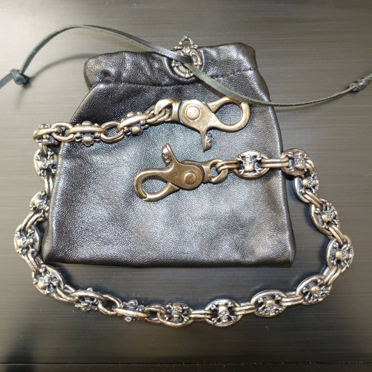 Logan Riese wallet chain Skull Rogan lease 