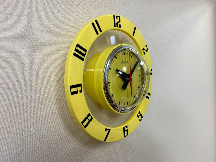 vintage atomic yellow clock 