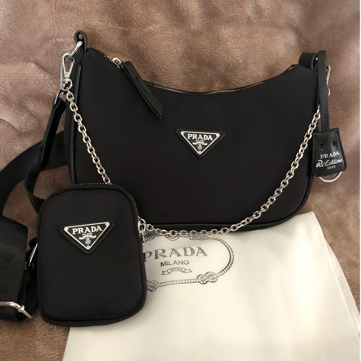 prada ファーウォレットチェーン