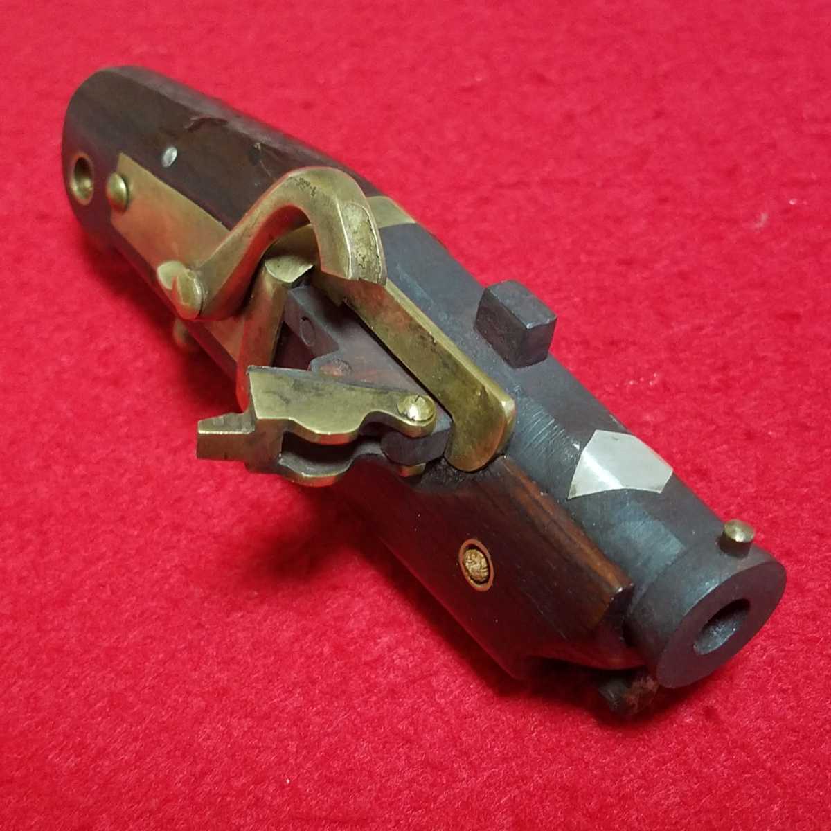 # matchlock # netsuke # mechanism . movement. # disassembly . is possible to do #. law goods # iron ., netsuke, old style gun, gun, ornamental gun, replica #B10