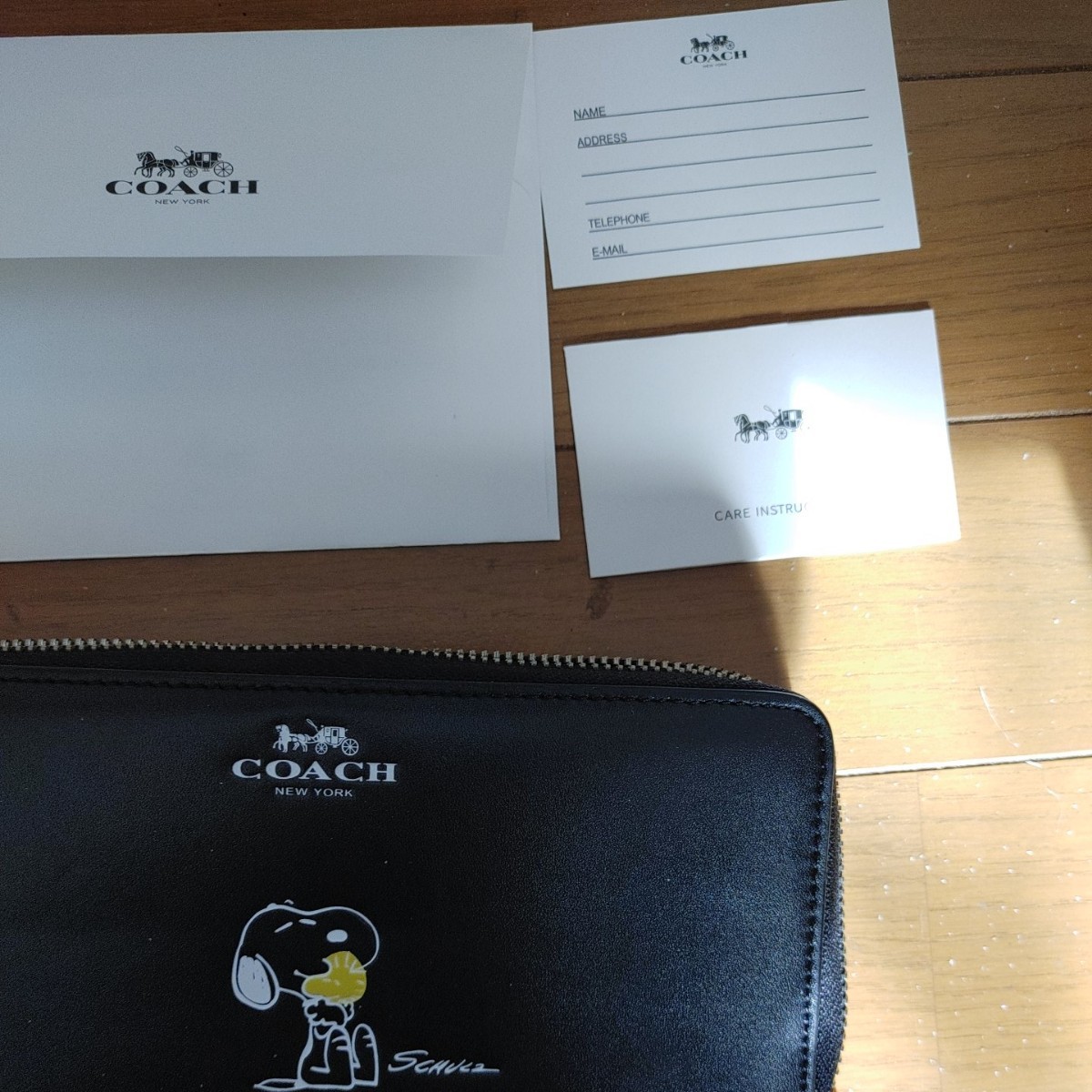 Paypayフリマ コーチ スヌーピーコラボ 長財布 ブラックハグ柄 Paypayフリマ コーチ スヌーピーコラボ 長財布 ブラックハグ柄