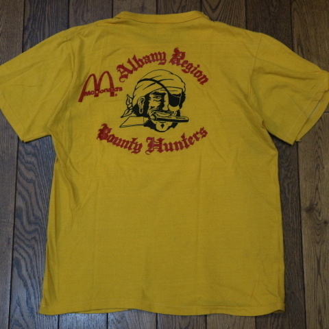 70s McDonald's Albany Region Tシャツ L イエロー Bounty Hunters マクドナルド ロゴ 海賊 イラスト 両面プリント 企業 ヴィンテージ イラスト、キャラクター