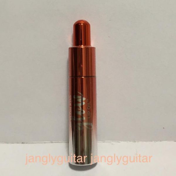  new goods * Revlon Kiss Glo u lip oil 004 CORAL GLOW