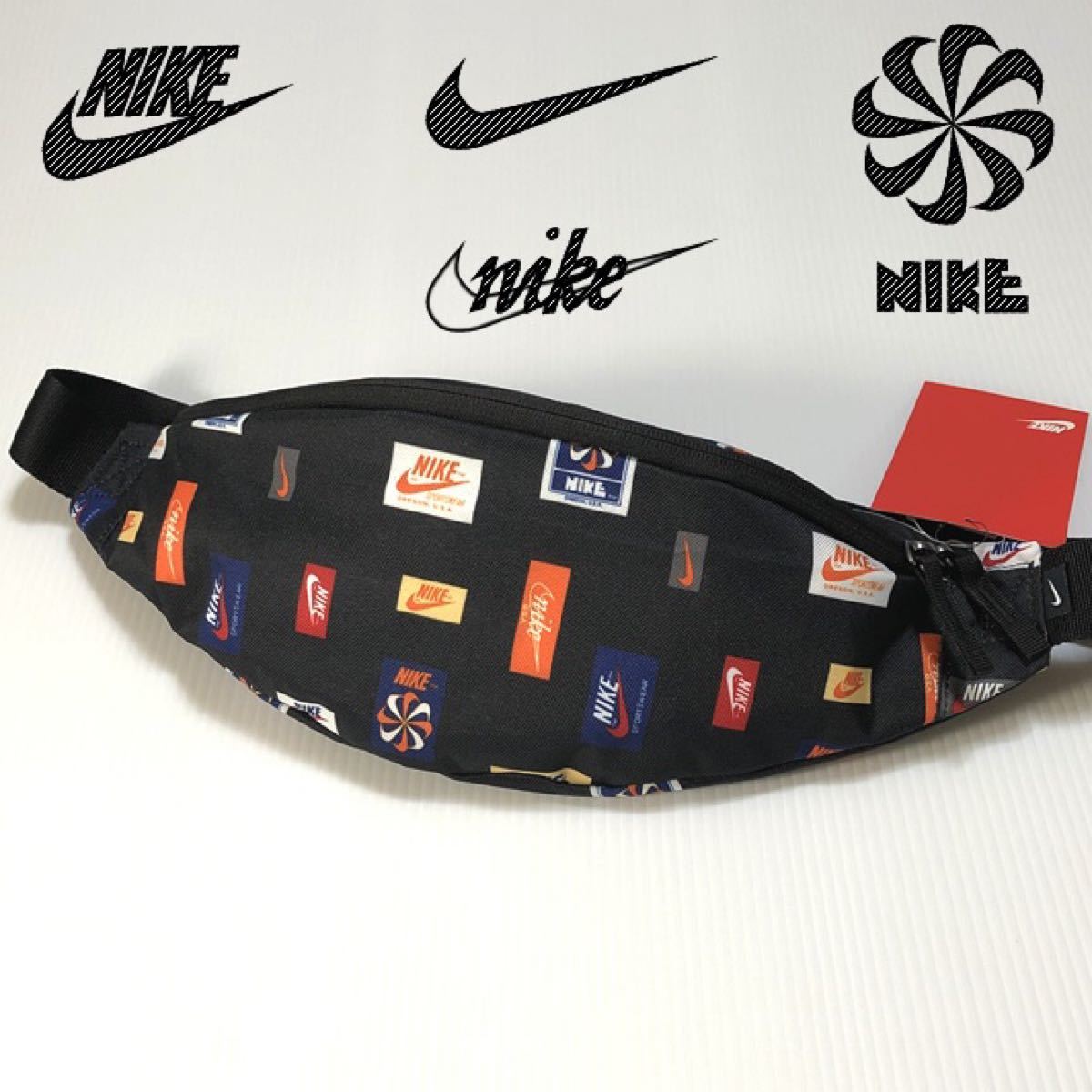 NIKE ナイキヘリテージ マルチロゴ 総柄 ウエストバッグ NIKE ナイキヘリテージ マルチロゴ 総柄 ウエストバッグ