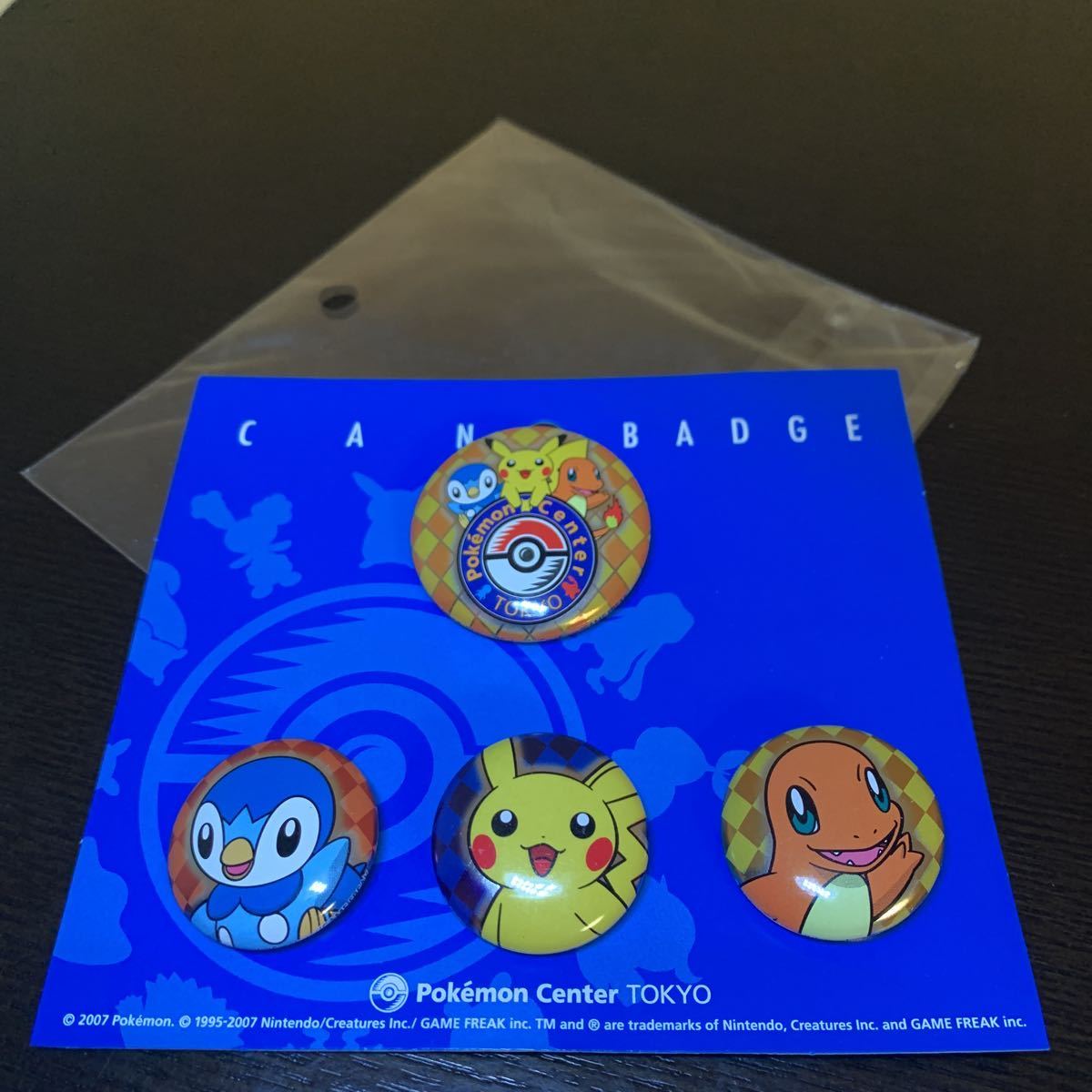 ポケモンセンター トーキョー ロゴ缶 バッジ セット 中古品 ピカチュウ ポッチャマ ヒトカゲ ピチュー 2007 バッヂ_画像1