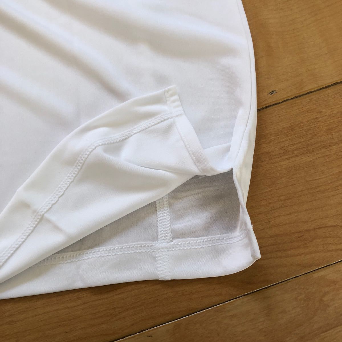 【新品】ナイキ　ランニング　長袖Tシャツ　レディース　Lサイズ　ホワイト　白
