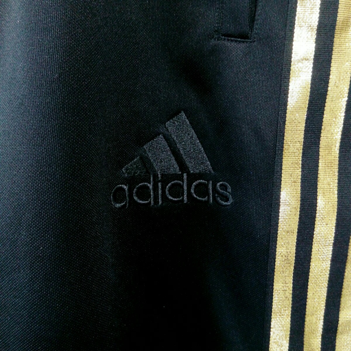 adidas アディダス　トラックパンツ　ジャージ　サイドライン　ファイヤーバードワンポイントロゴ　ゴールド