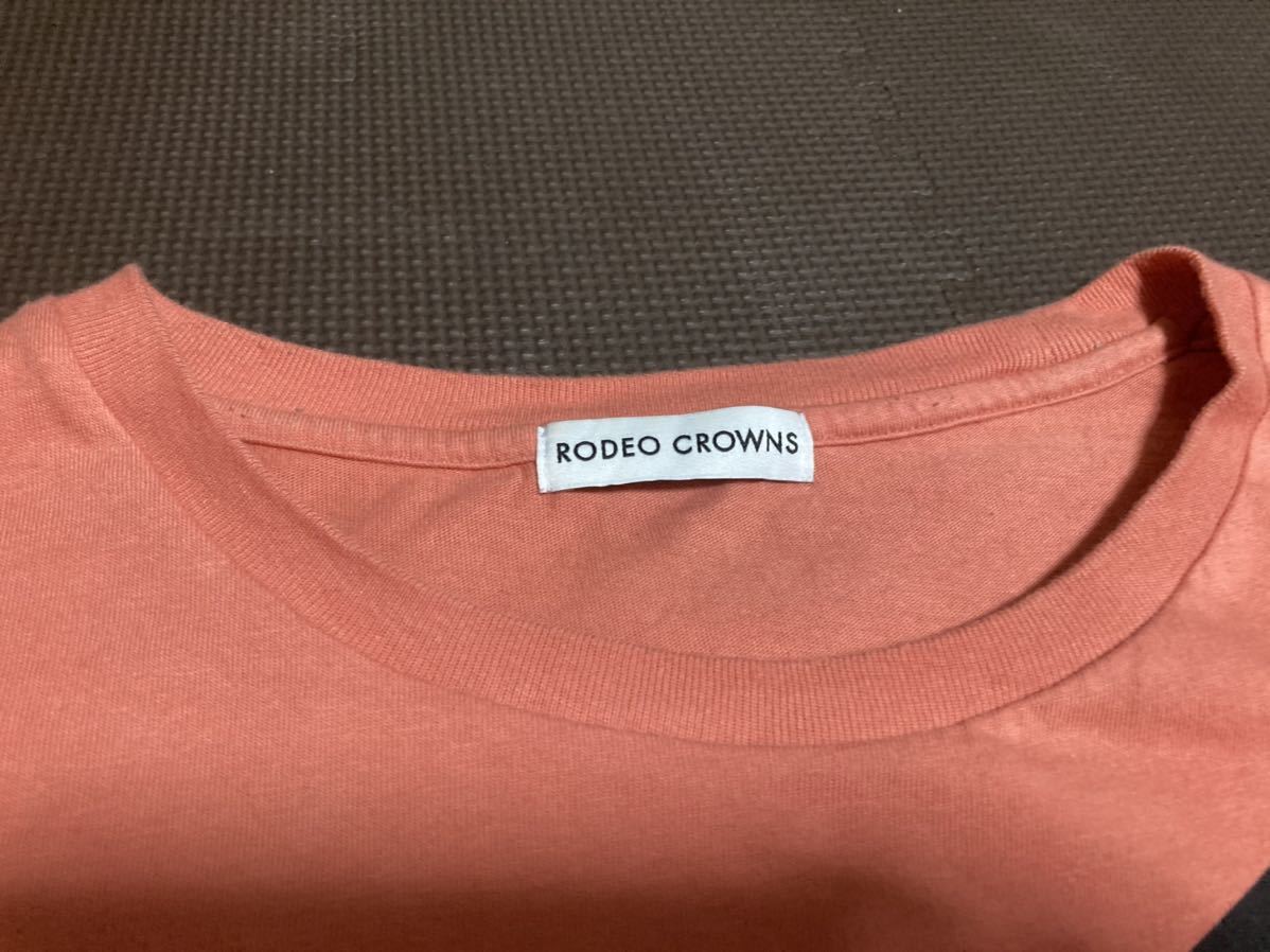 RODEO CROWNS薄いオレンジ、ロゴ黒ビックストレッチトップス　サイズF_画像3