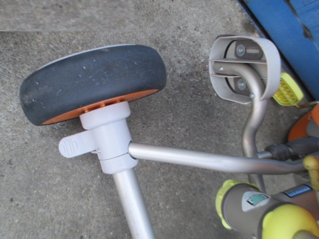  tricycle pushed . hand handle attaching 