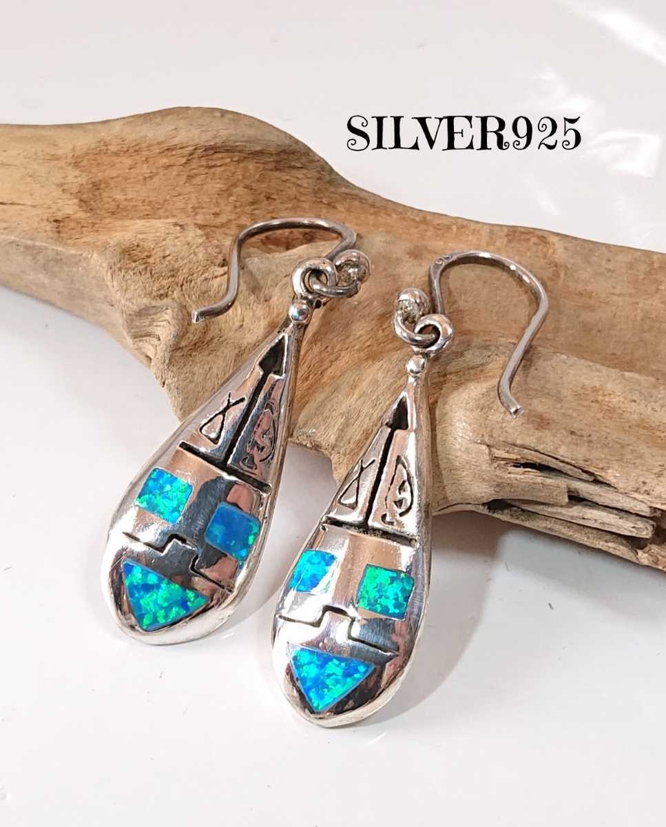4594 SILVER925hiero grif blue opal earrings silver 925 sun face wall . Teardrop . tears type ejipto character stylish 