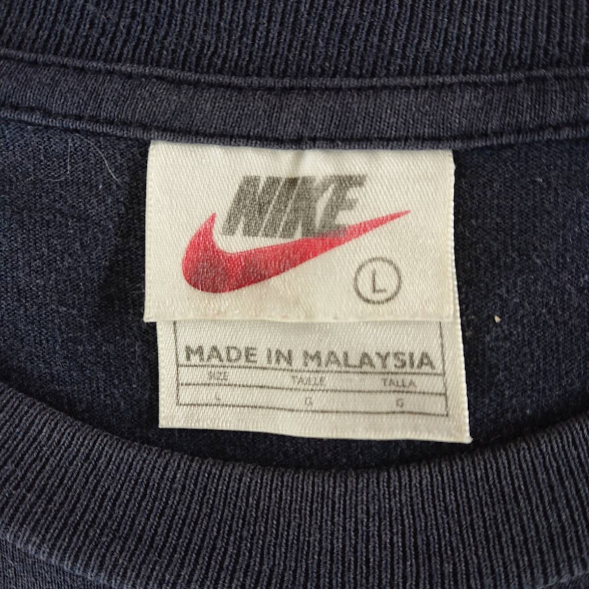 NIKE ナイキ Tシャツ ネイビー Made in Malaysia マレーシア製 白タグ ビンテージ サイズ KID’SL 半袖 綿100％ 小穴 汚れアリ_画像1