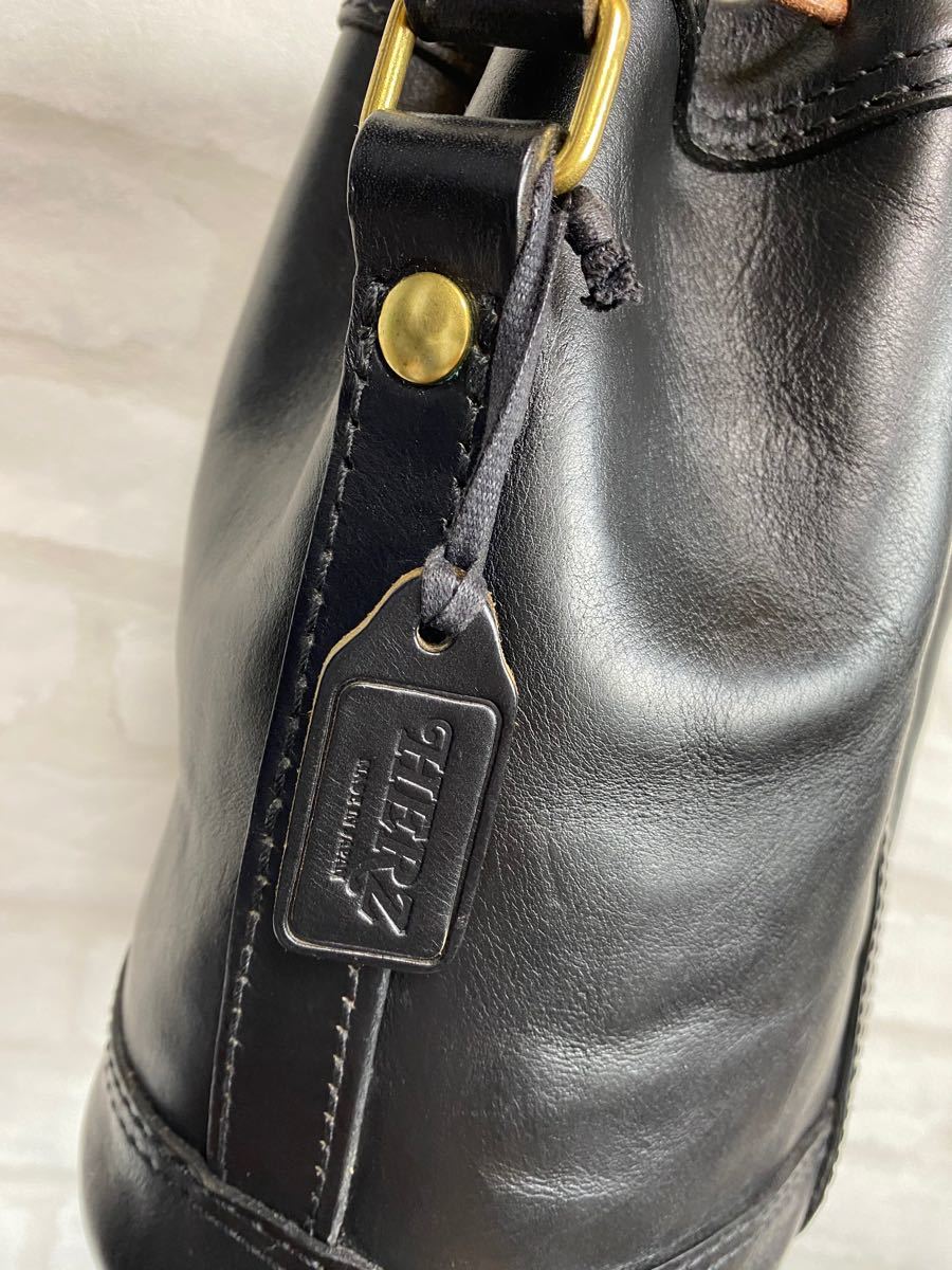 HERZ レザーショルダーバッグ 巾着 ショルダーポシェット ショルダーバッグ ブラック ヘルツ