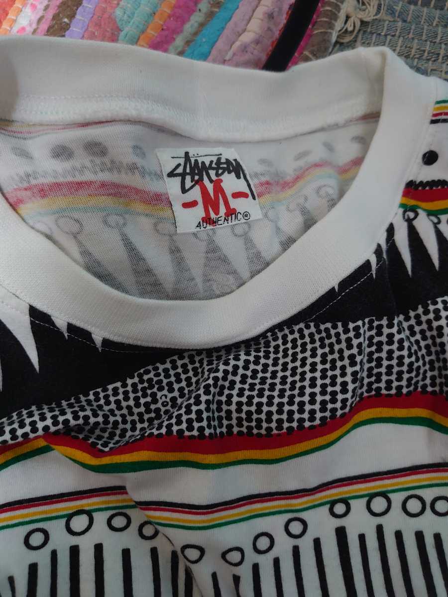 STUSSY ステューシー タムタムプリントTシャツ 中古 Mサイズ ビンテージ初期復刻 Vintage 総柄ラスタカラー SSリンク_画像3