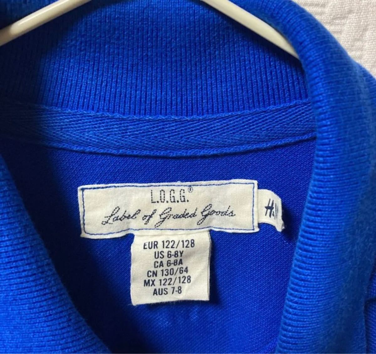 H&M（エイチアンドエム）ブルーのポロシャツ