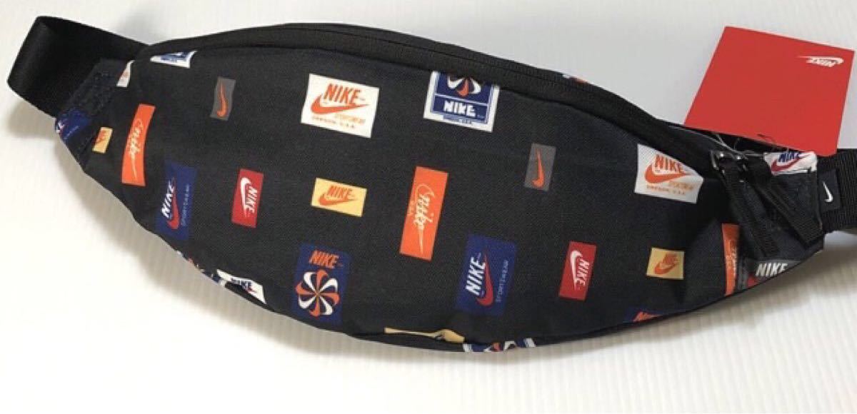 NIKE ナイキヘリテージ マルチロゴ 総柄 ウエストバッグ NIKE ナイキヘリテージ マルチロゴ 総柄 ウエストバッグ