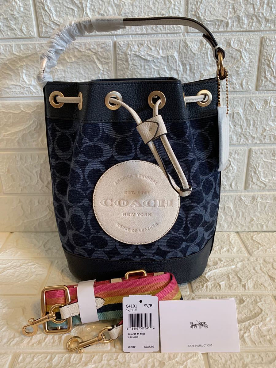 COACH デンプシー ドローストリング バケット バッグ シグネチャー
