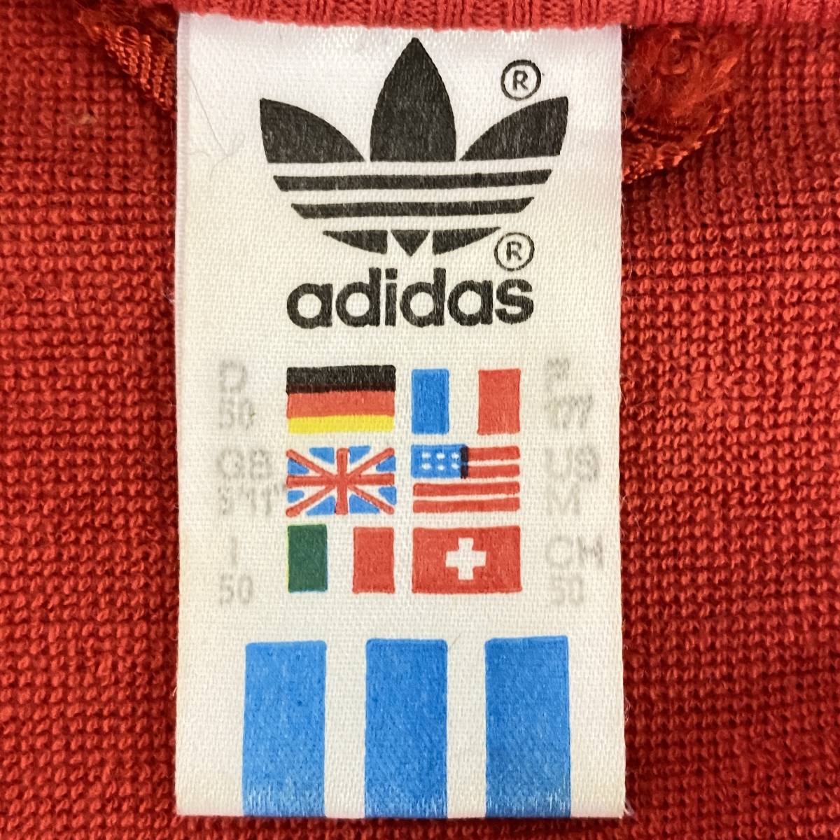 80年代【adidas】アディダス ハンガリー製 ヴィンテージ トラックジャケット ジャージ ジップアップ ライン 万国旗タグ ブルゾン 80s