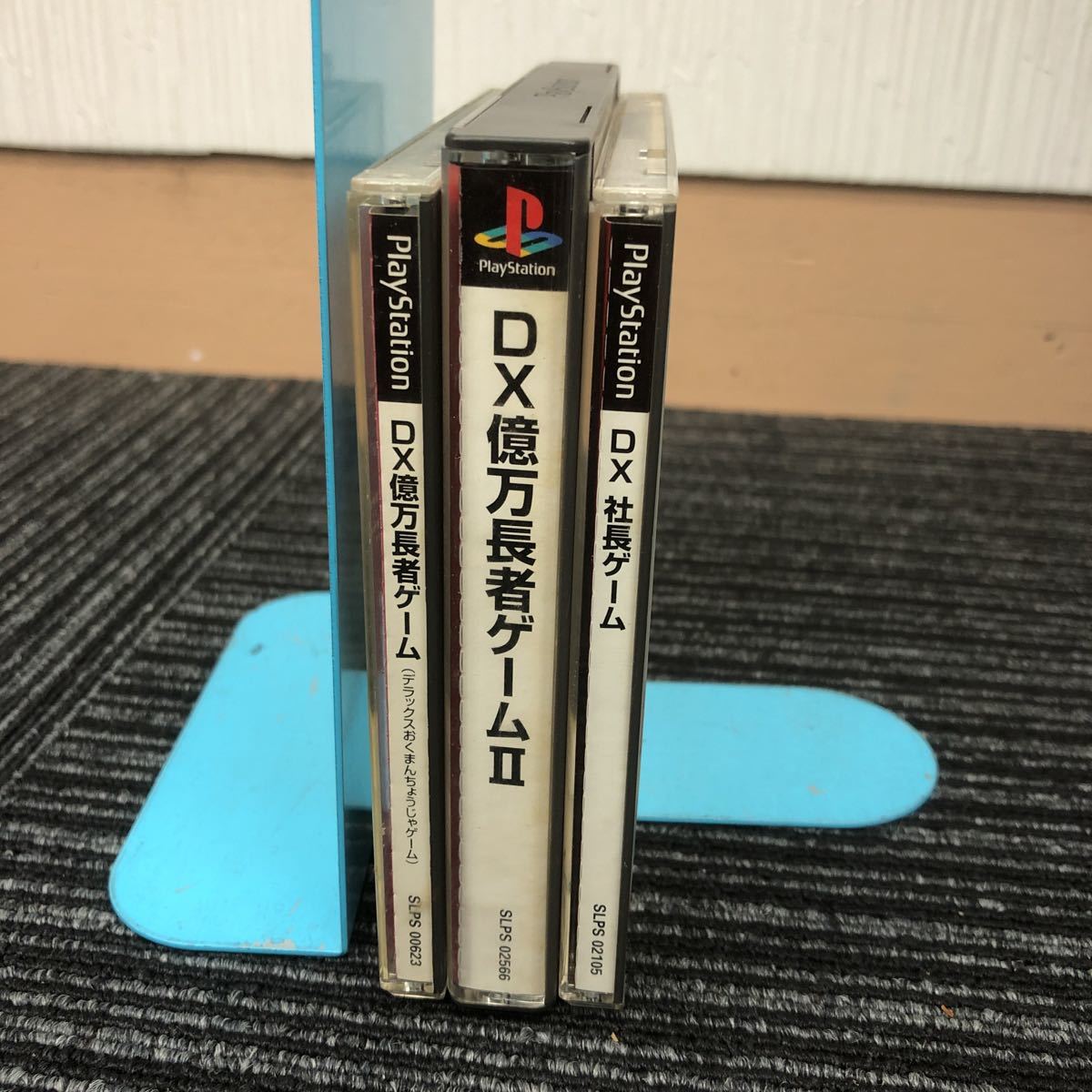 ｋ【あ8】★まとめて3作品★PS1　DX億万長者ゲームⅠ/Ⅱ/DX社長ゲーム　タカラ　ルーレット　人生ゲーム　PS　ジャンク　現状_画像3