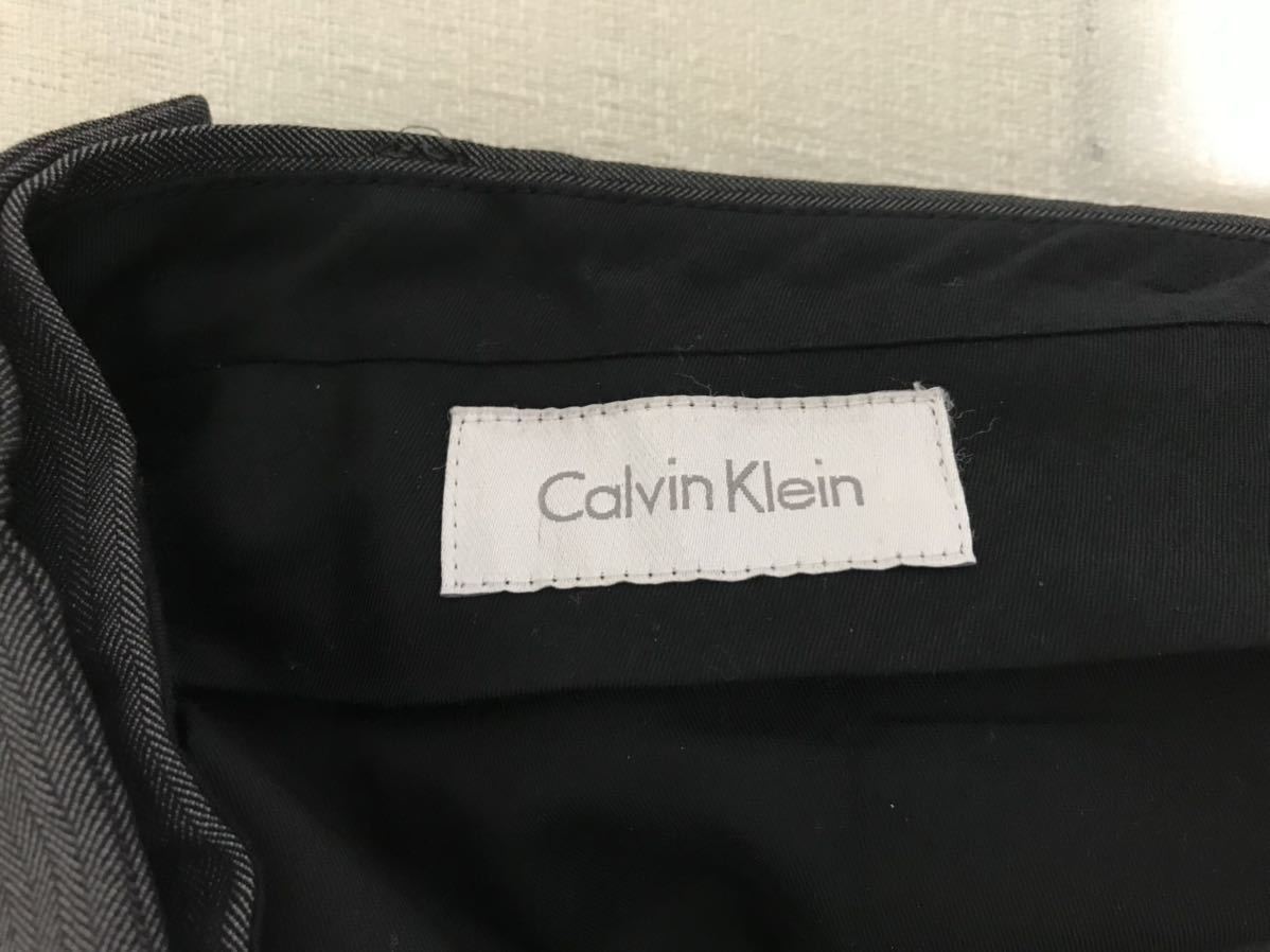 美品本物カルバンクラインCALVINKLEINウールセットアップスーツビジネスジャケットスラックスパンツメンズグレー柄34S