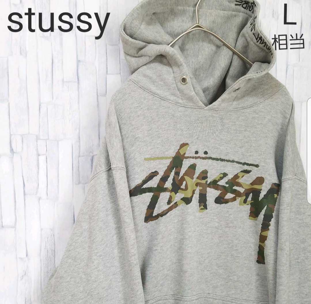 stussy ステューシー 長袖 パーカー スウェット プルオーバー ビッグロゴ デカロゴ ビッグプリント サイズM グレー フーディ  迷彩柄｜PayPayフリマ