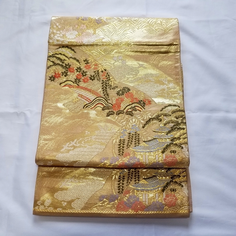 【桐輪】未使用品*美品｛正絹*西陣織*袋帯｝*金引き箔地*多色糸-金箔糸での風景と吉祥文様*六通柄*№3109_画像1