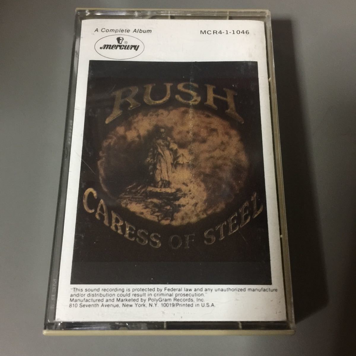 ラッシュ CARESS OF STEEL USA盤カセットテープ_画像1