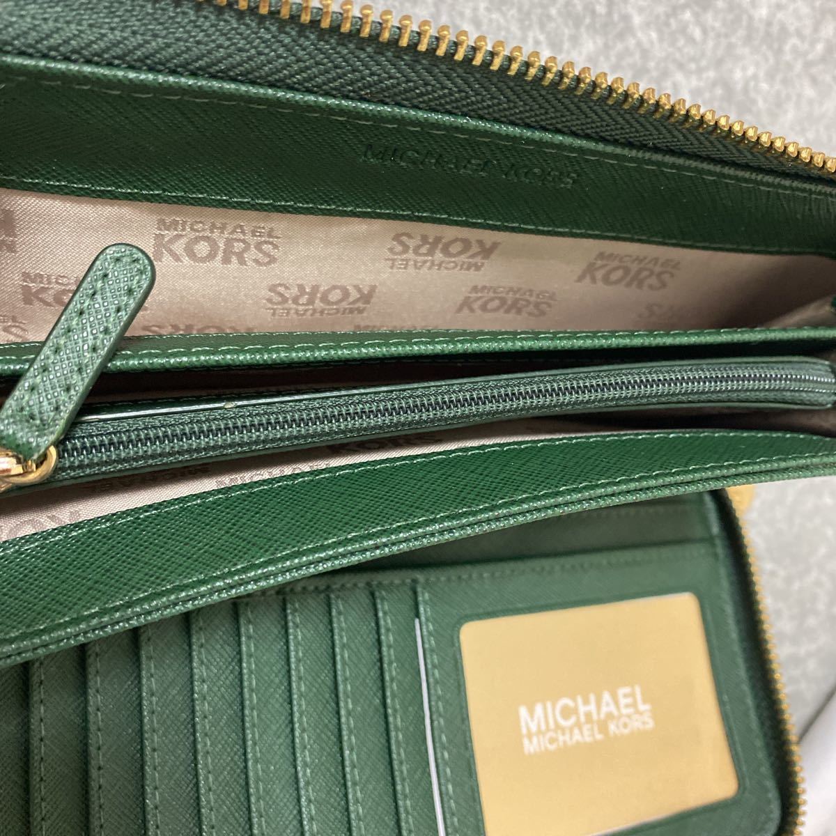 MICHAEL KORS ラウンドファスナー長財布 グリーン