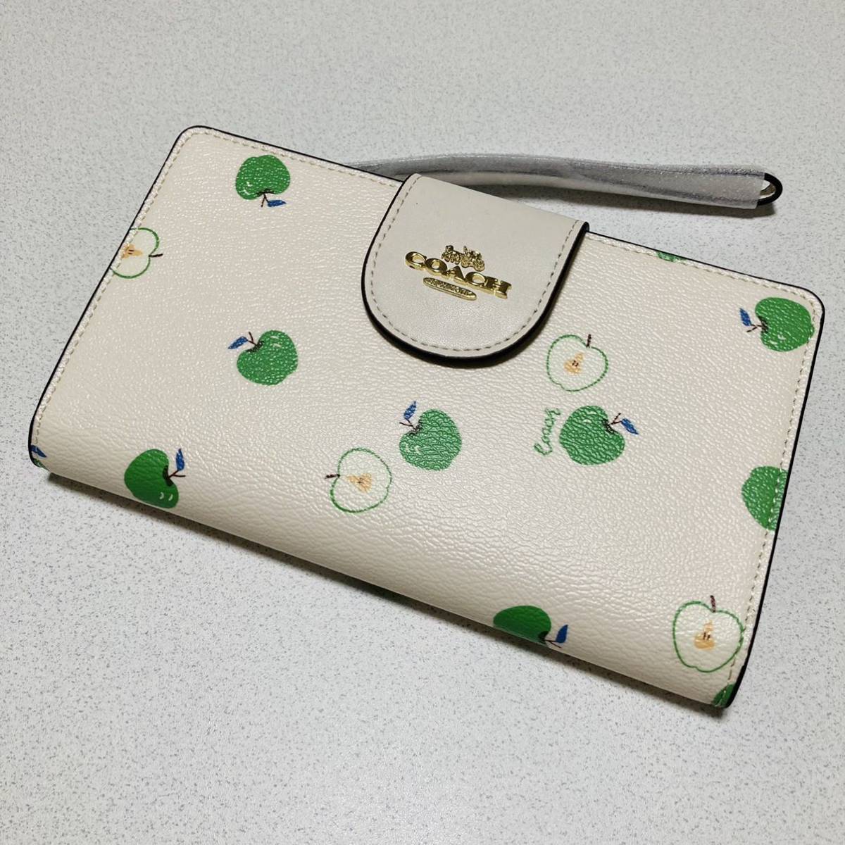 ☆新品 未使用☆COACH コーチ アップルプリント シグネチャー 二つ折り