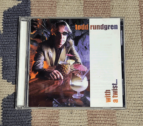 CD　ウィズ・ア・トゥイスト　Todd Rundgren　トッド・ラングレン 正規国内盤 歌詞・対訳・解説付 ディスク良好　割引特典あり_画像1