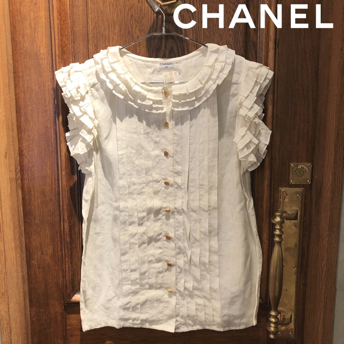 ヴィンテージ CHANEL シャネル シャツ ブラウス ノースリーブ フリル ココマーク 金ボタン レディース アイボリー トップス 10679