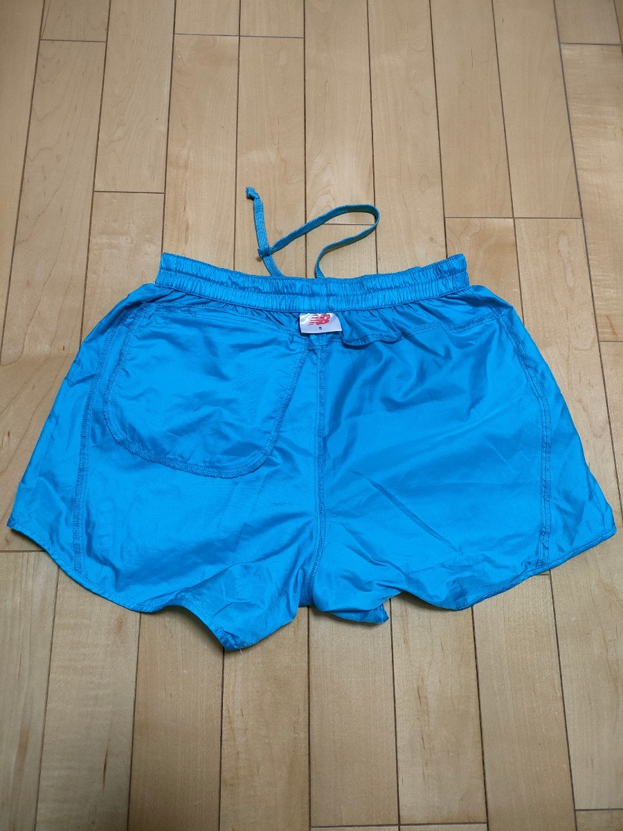 【美品】ニューバランスNew Balance レデイース ランニングパンツ ジョギングパンツ Sサイズ 水色 ショートパンツ