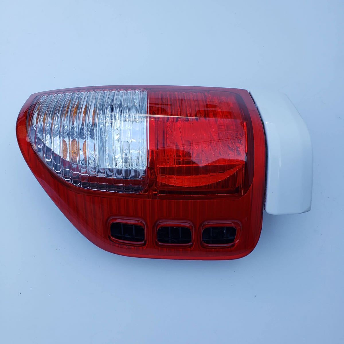 [ free shipping ] Isuzu Wizard UES73FW UES25FW original left tail lamp tail light KOITO 220-16147 beautiful goods 