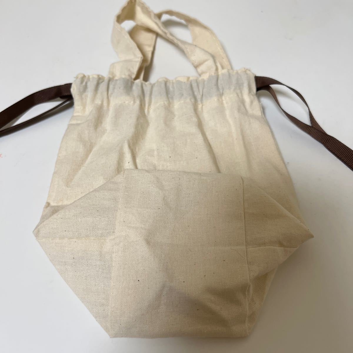 巾着袋 巾着ポーチ コスメキッチン　cosme kitchen プレゼント　包装紙 保存袋