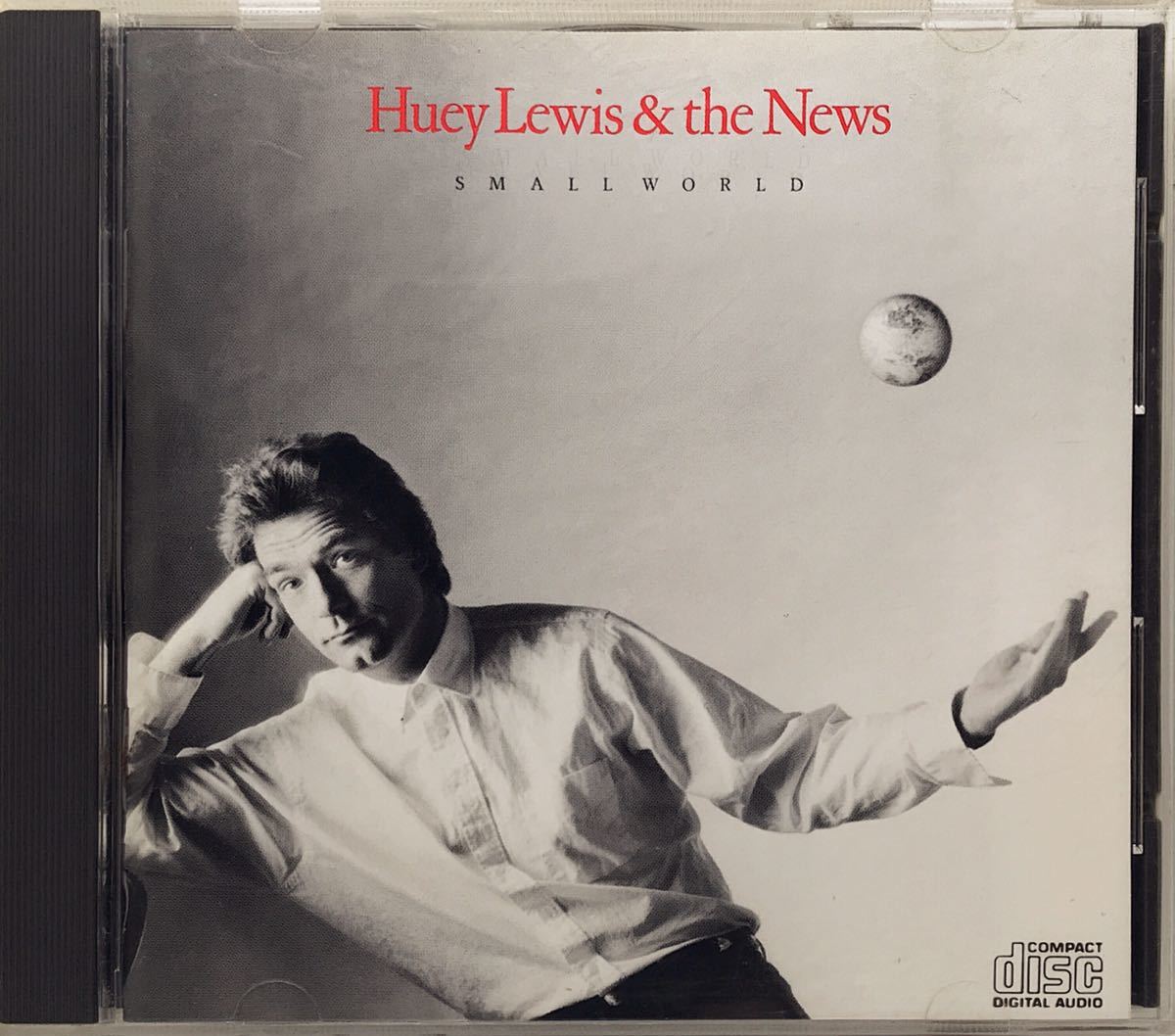 【プレ対象】CD ★ HUEY LEWIS & THE NEWS ★ SMALL WORLD ★ 1988年 ★ 輸入盤中古品_画像1