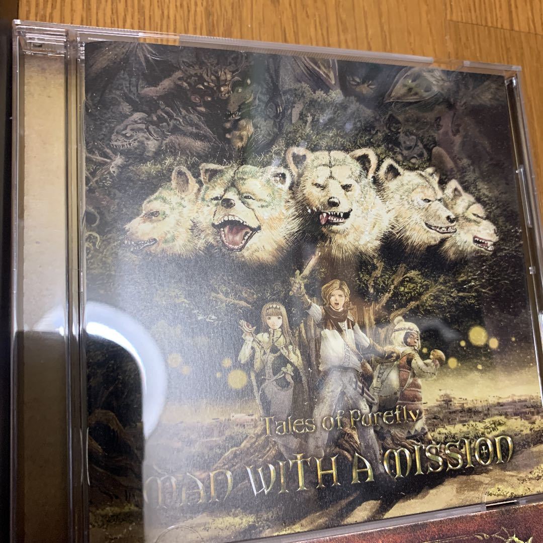 送料無料！美品！MAN WITH A MISSION 初回限定盤 Tales of Purefly スリーブケース付き ブックレットあり 帯付きの画像3