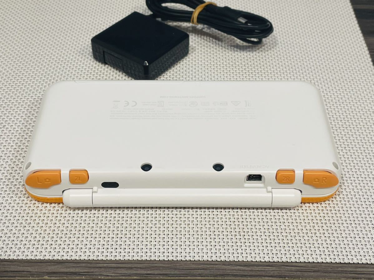 newニンテンドー2DS ホワイトオレンジ　本体動作品　送料無料　充電器 付き