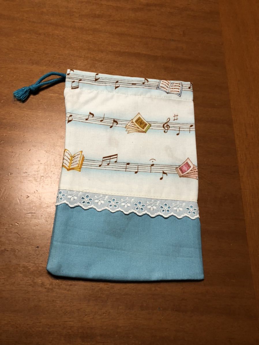 ** musical score * sound .( light blue )* pouch small ( lining attaching )